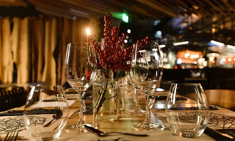 beautiful-decorated-xmas-table-with-a-red-candle-2023-11-27-05-19-57-utc copy Staff Christmas Event