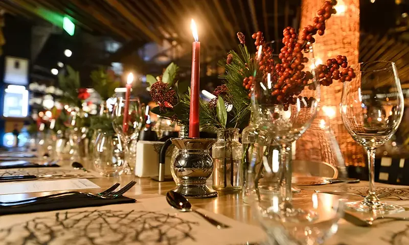 beautifully-decorated-xmas-table-with-red-candles-2023-11-27-04-53-49-utc copy Staff Christmas Event